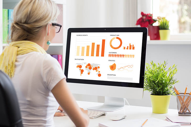 A program manager looking at data visualizations.